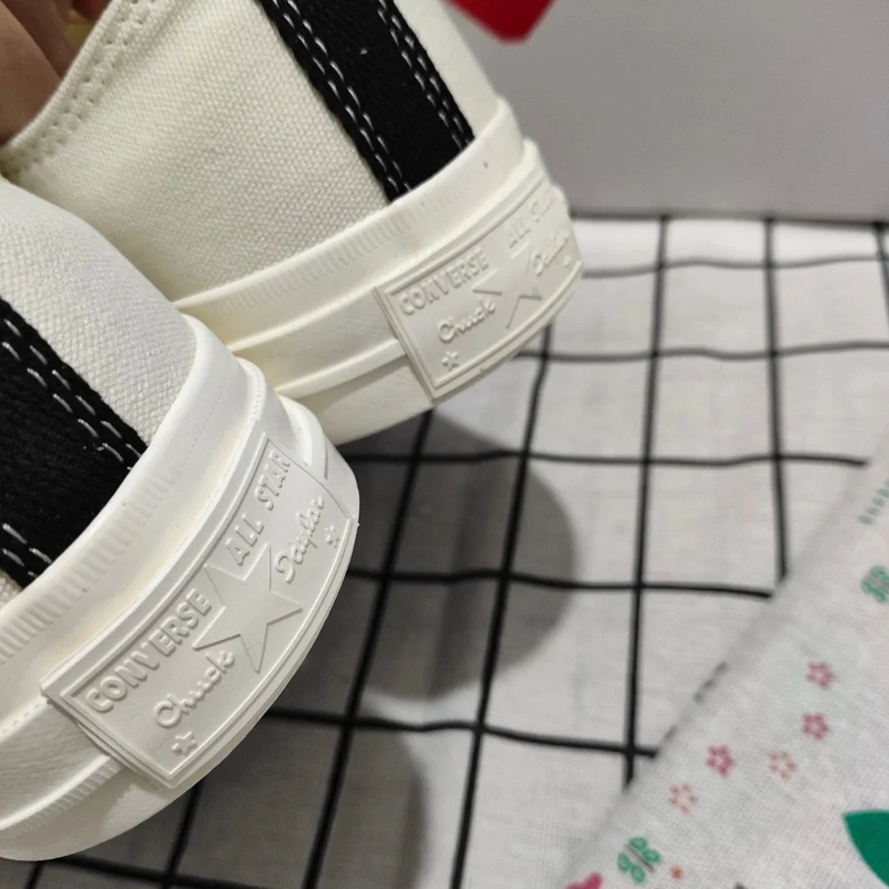 Comme des Garçons PLAY Cream Slip-On Sneakers with Red Heart Logo